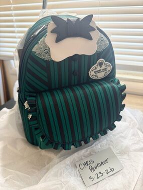Brand new the Haunted Mansion Ghost Host Loungefly Bag.